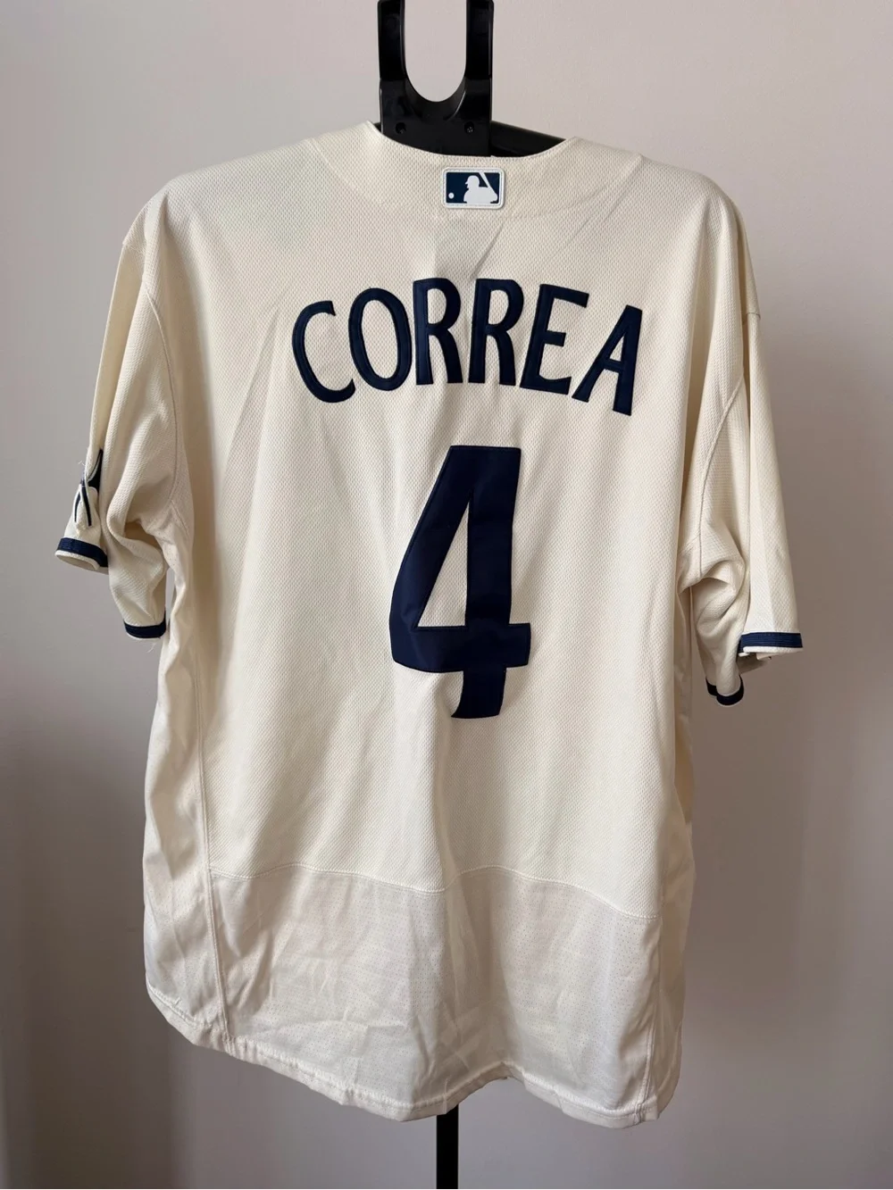 Nike Cream Twin Cities Baseball Jersey with Navy Script & Number 4